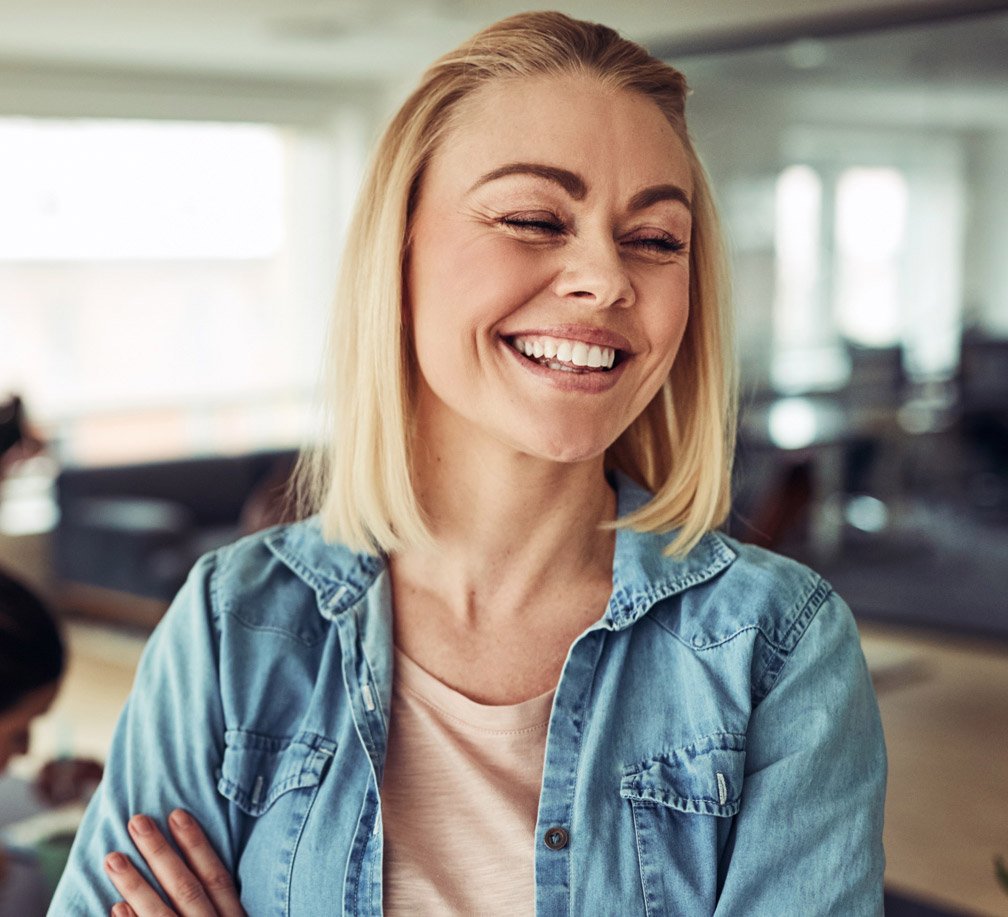 laughing-young-businesswoman-with-colleagues.jpg