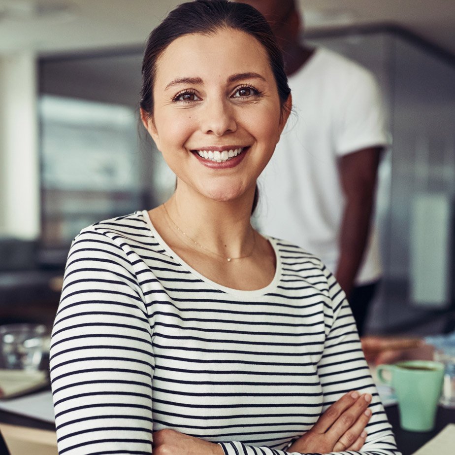 smiling-young-businesswoman-sitting-with.jpg